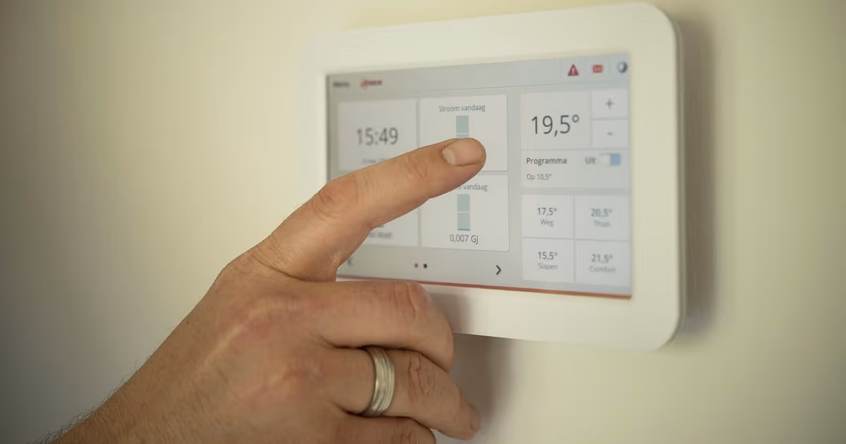 A short-term rental manager reviewing AI-drafted owner follow-ups and turnover tasks on one screen in 2026