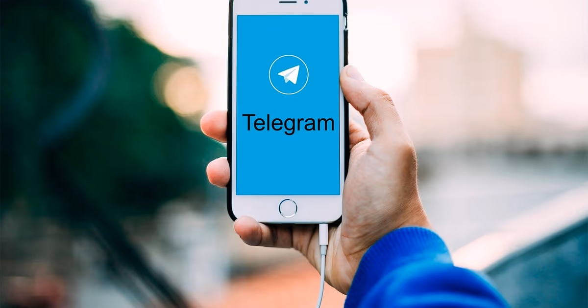 Smartphone showing a WhatsApp conversation being handled by automated customer service