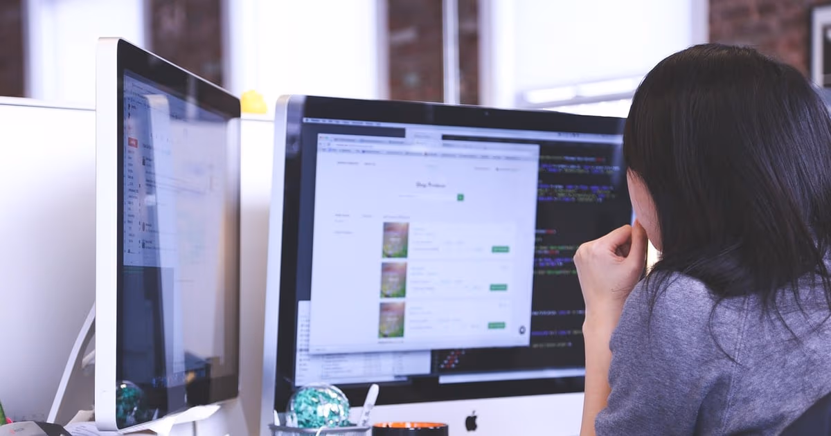 Professional reviewing a project management dashboard on a laptop - representing the best project management apps in 2026