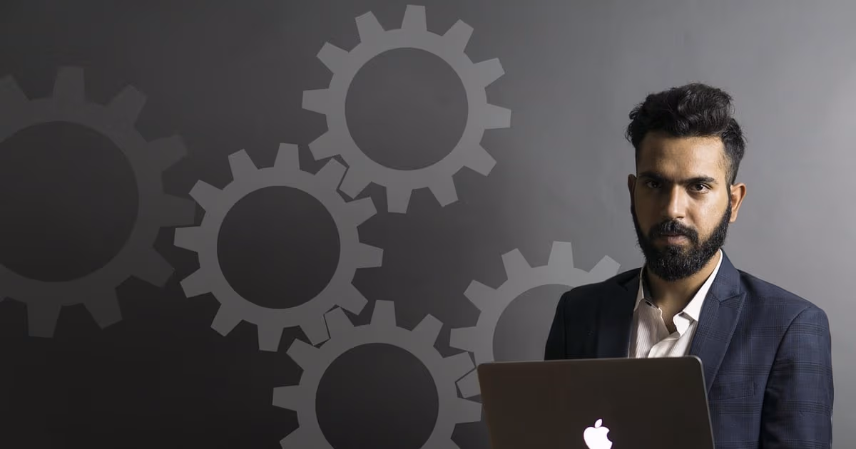 Small business owner reviewing automated tasks and follow-ups on a laptop