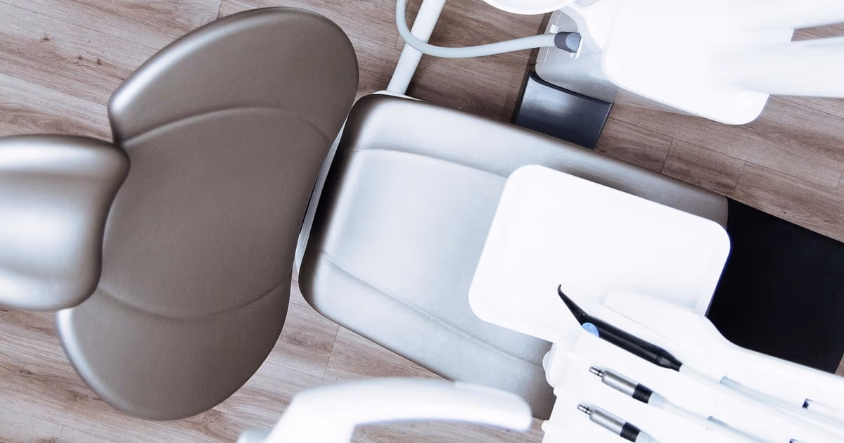 Dental practice front desk representing patient booking and recall software for dentists in 2026