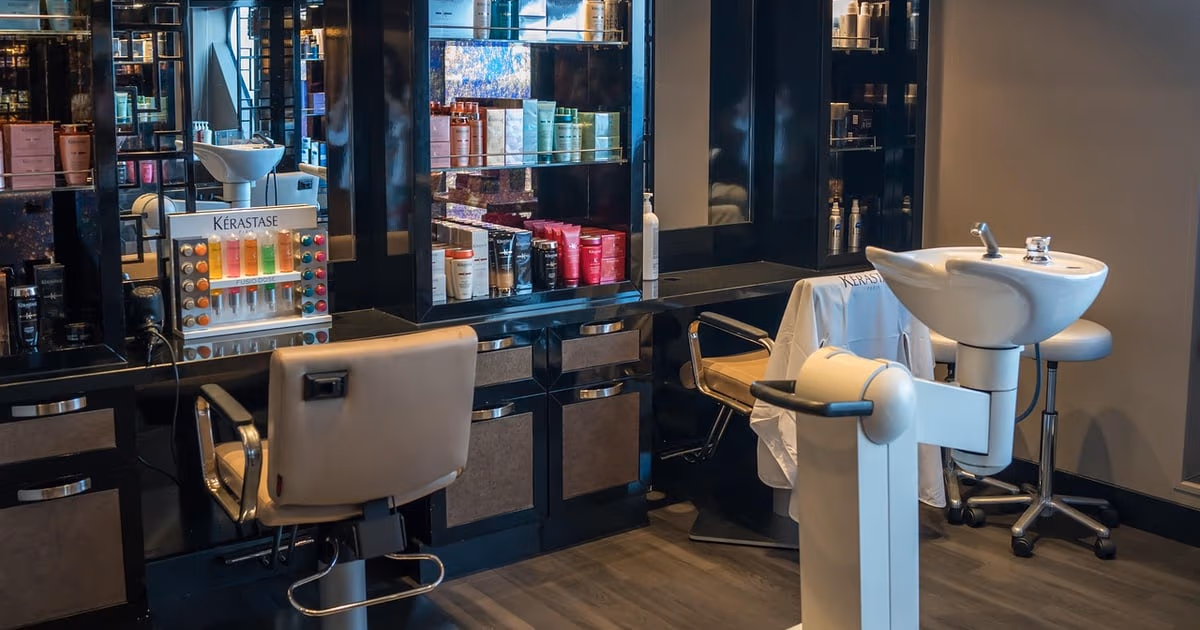 Modern salon chair and styling station representing the best CRM software for salons and barbershops in 2026