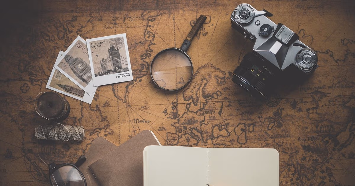 Travel agent planning client itineraries on a laptop, representing the best CRM for travel agents in 2026