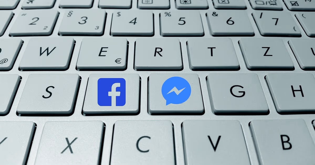 Keyboard with Facebook and Messenger keys, representing Facebook Messenger automation for small businesses
