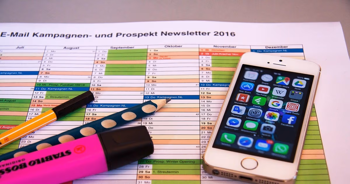 Smartphone showing a WhatsApp chat next to a calendar, representing scheduling WhatsApp messages to send later