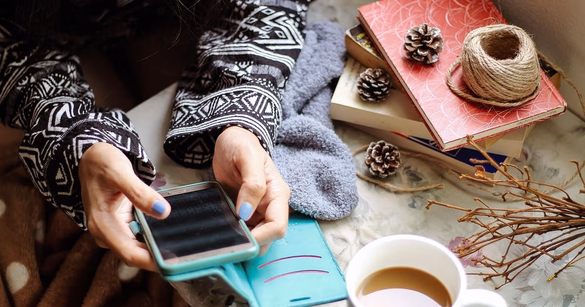 Smartphone showing an Instagram post with comments, representing comment to DM automation for small businesses