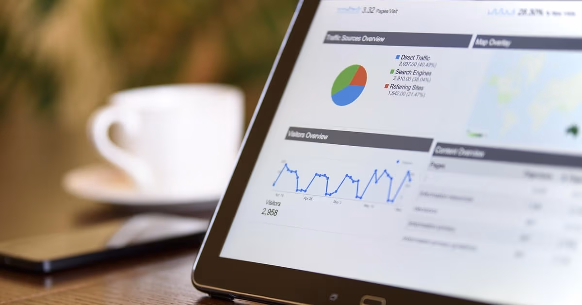 Small business owner at a desk learning what CRM means and how it works