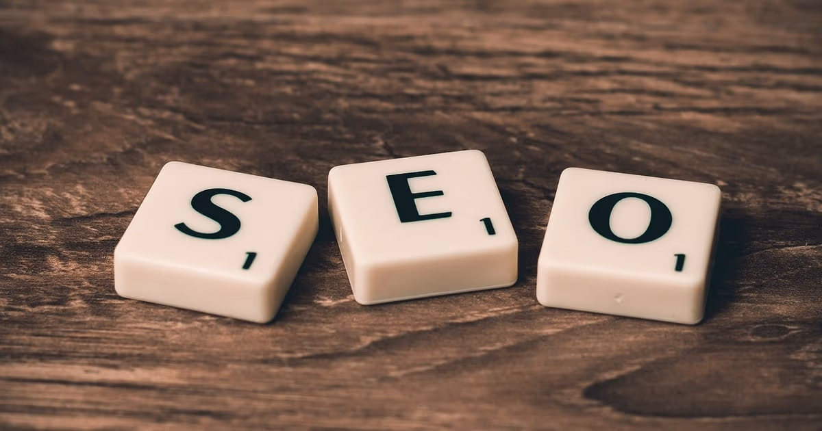 Person holding a smartphone with a chat app open, representing new leads arriving on WhatsApp